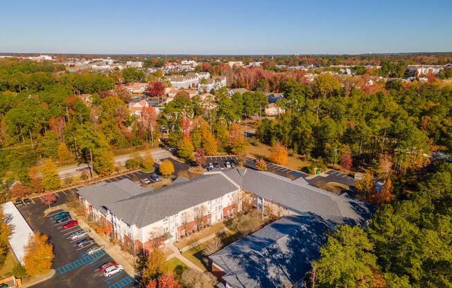 an aerial view of a building in the middle of a city