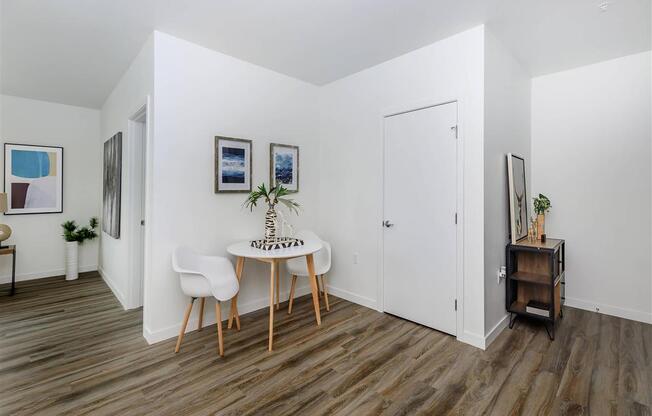 a dining room with a table and chairs at Jefferson Yards, Tacoma, WA 98402