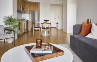 a living room with a couch and coffee table