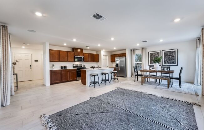 Be the first to live in this brand-new expansive two-story former model home!