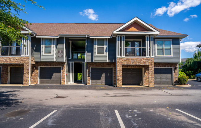 Exterior Of Apartment Homes With Garage Parking Beneath