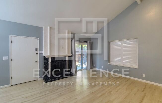 2/1 Single Story Condo With 2 Car Garage, Private Front & Back Patio & Updates Throughout!