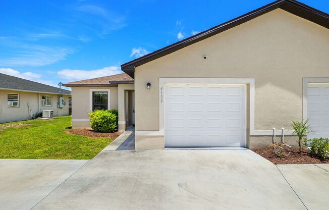 Newly Constructed 3 bed 2 bath duplex with garage.