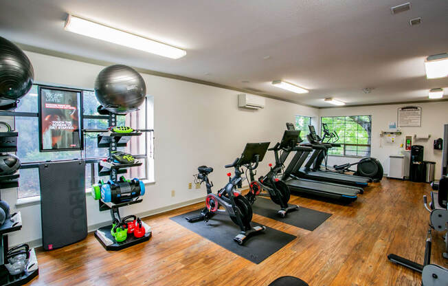 Gym with Free Weights at Apts in Renton