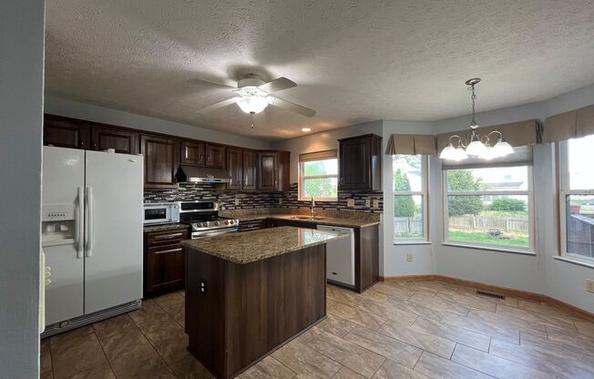Spacious 3-Bedroom Home with Office, Basement & Fenced Yard