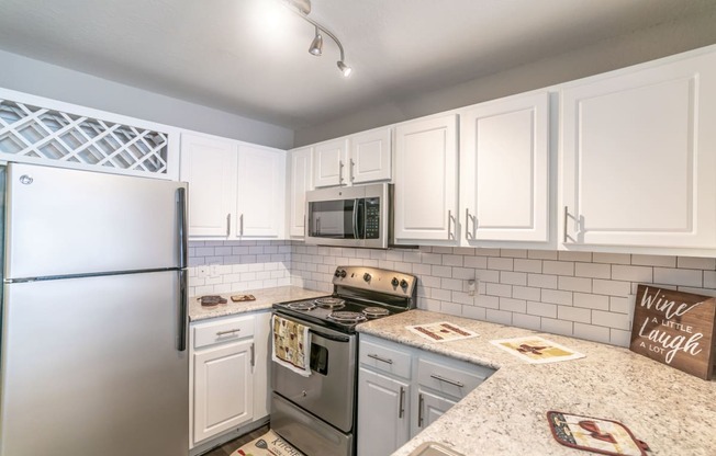 Kitchen at Mission Club Apartments in Orlando, FL