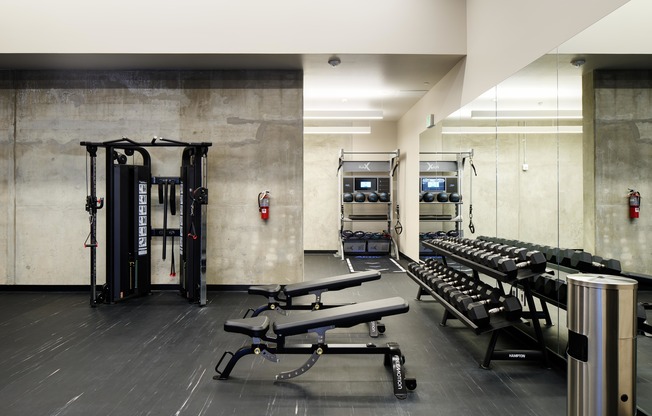 Club-quality fitness center with weights, cardio + virtual on-demand fitness options.