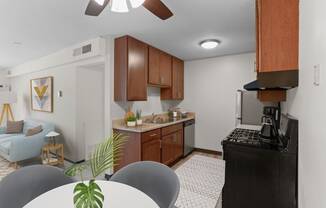 a kitchen and dining area in a 555 waverly unit