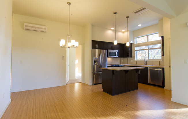 **Move in special of 50% off the first month's rent!** Incredible Top Floor Unit with Parking, Balcony, Community Pool, & Laundry in Unit