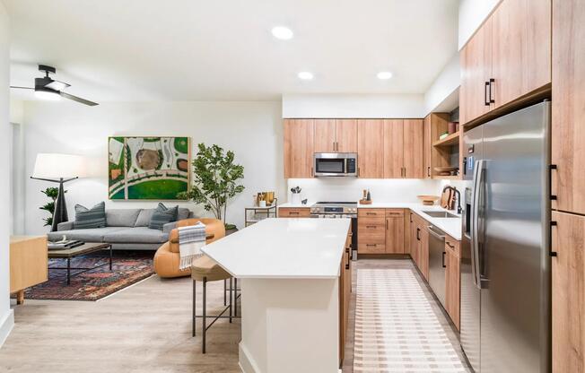 Open-concept living at Modera St. Paul combines sleek kitchens with inviting lounges, creating the perfect setting for life in downtown Dallas.