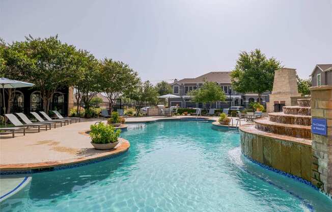 the swimming pool at the estates apartments