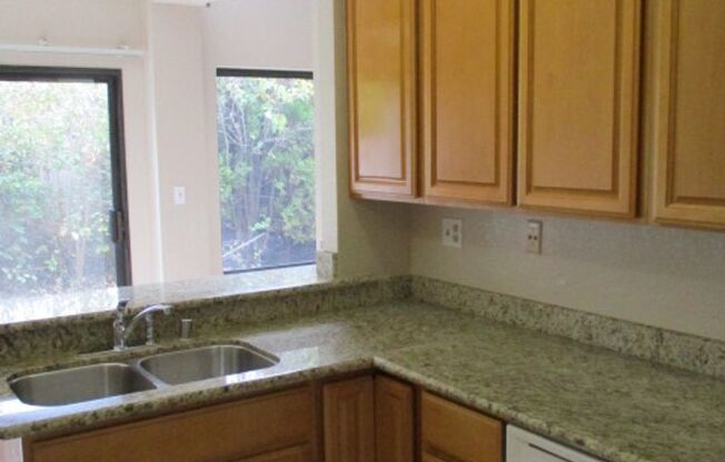 Remodeled Forest Park Ardenwood Home is beautiful 4 bedroom with newer flooring & paint!