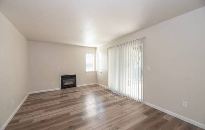 Autumn Oaks vacant Canyon II living room and fireplace