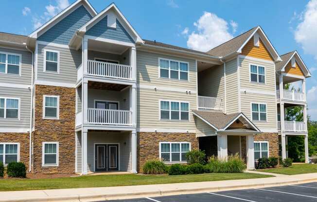 Bright Apartment Home Exteriors with Trees Inviting You Inside at Ashby at Ross Bridge, Hoover, AL 35226