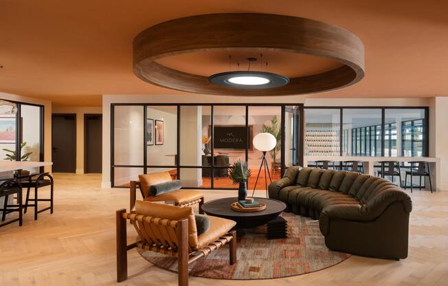 Warm tones, layered textures, and contemporary design set the tone inside Modera Rio Salado’s inviting resident lounge.