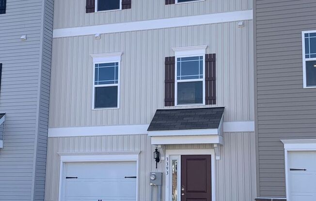 Beautiful, 3-story modern townhome with 3 beds/2.5 baths and a bright, airy, spacious feel!