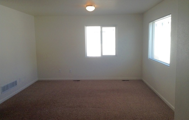 3 BEDROOM, 2.5 BATHROOM, SADDLE RIDGE TWINHOME WITH 2 CAR ATTACHED GARAGE