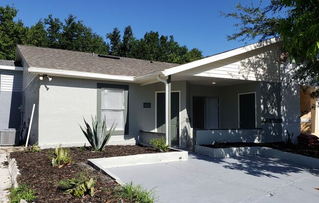 Ground Level Condo; Private Driveway; Corner Unit; Outdoor Space; Quiet Street
