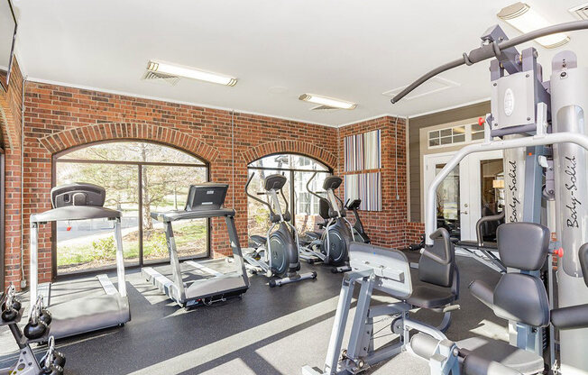 24-Hour Multi-Level Cardio And Weightlifting Center at Reflection Cove Apartments, Manchester, Missouri