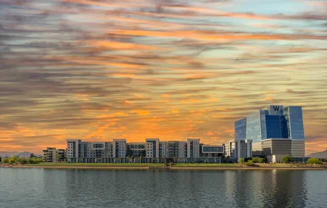 a city with a lake in front of it