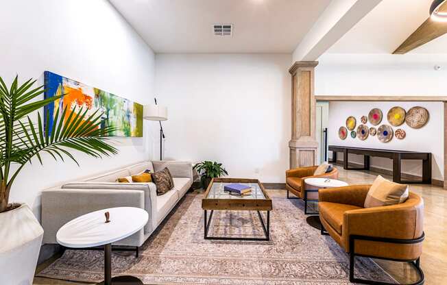 Living room with couches and chairs and a table at The Parker Austin, Texas