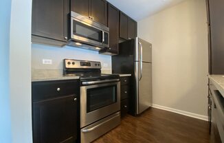 Stainless steel appliances with a built in microwave