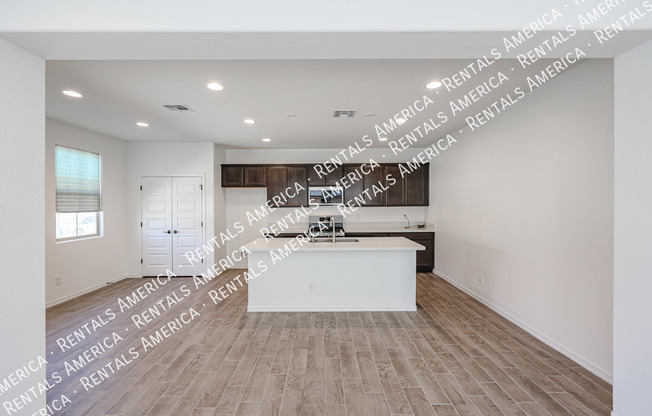 14243 W HACKAMORE DR