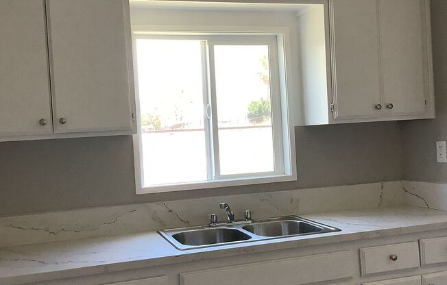 6202-12/S Newell Ave.