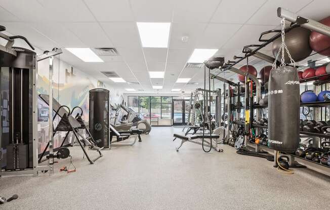 the gym at the flats at obsidian tower apartments