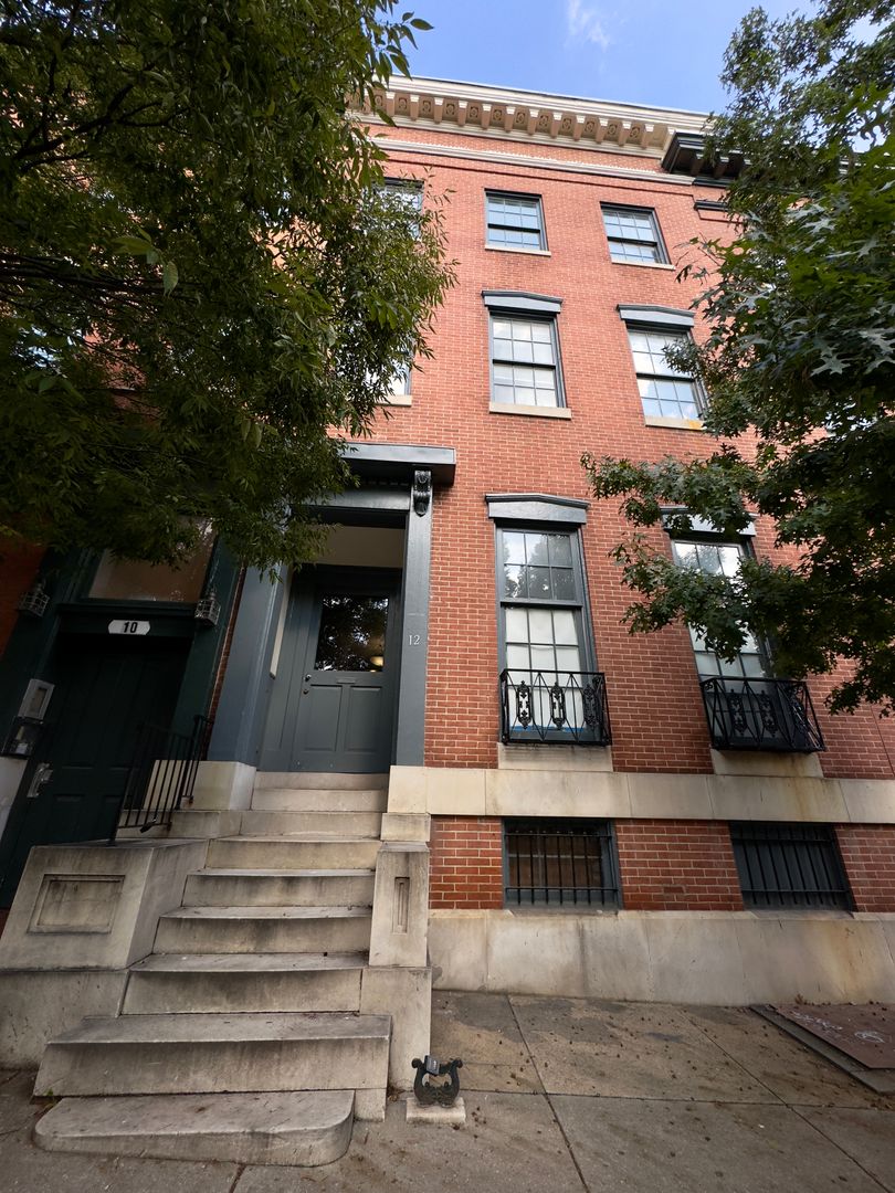 For Rent: Historic Charm at 12 E Madison St – Your Urban Sanctuary Awaits!