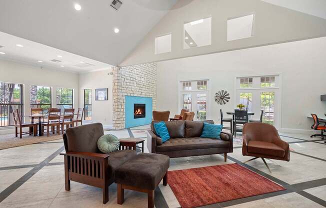A living room with a fireplace and a couch.
