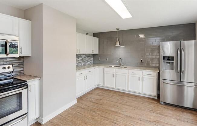 Kitchen white interior at Zen Chaska, Minnesota, 55318