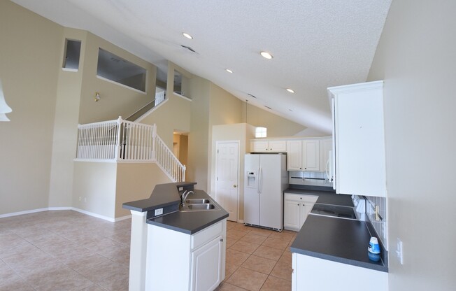 AMAZINGLY SPACIOUS 4-Bedroom Home with Loft in Gated Northshore at Lake Hart – Golf, Tennis & Lake Access!