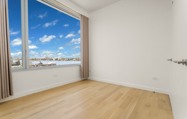 611 W 56 ST