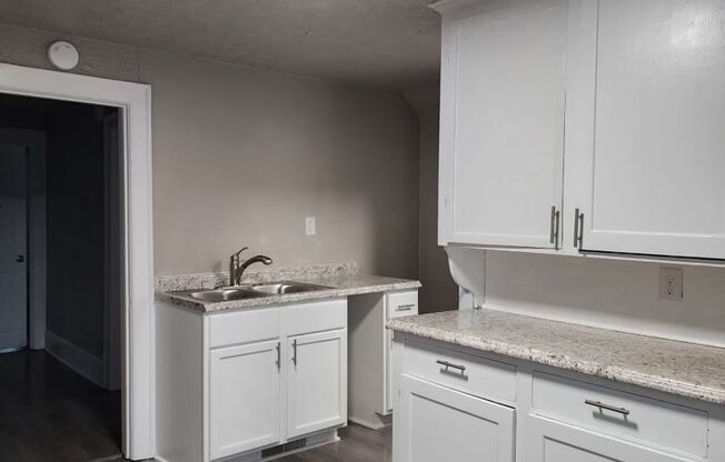 702 S. Commercial St / 109 Division St