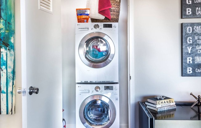 a front loading washer and dryer in a laundry room