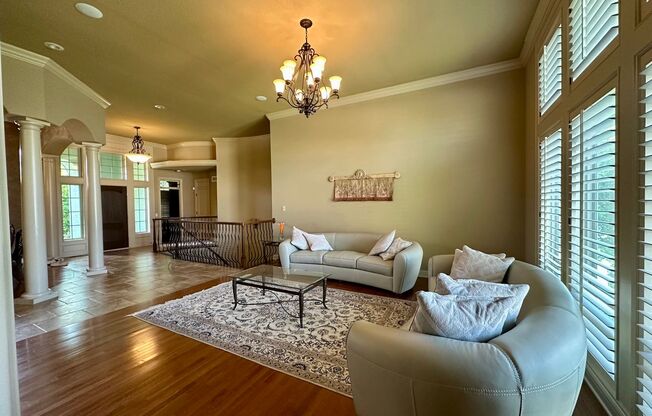 {9003} Wilshire Farms Reverse 1.5 Story Home + Walkout Basement + Three Car Garage + Fenced Yard