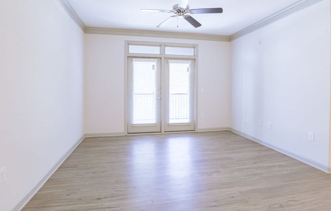 Living Room with Balcony and Hard Surface Flooring