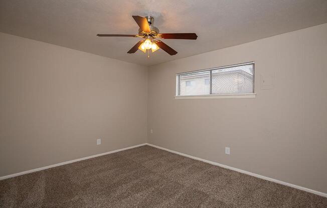 vacant carpeted bedroom