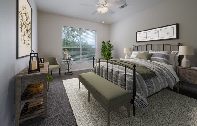 a bedroom with a bed and a ceiling fan