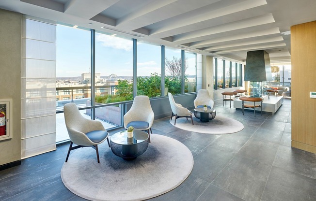 Expansive Rooftop Club Room With Indoor/Outdoor Area, Roof Deck Access, Fireplace & Numerous Seating Areas