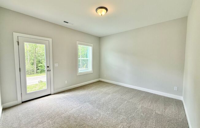 Stunning New Construction 3BD, 3.5BA Fuquay-Varina Townhome Near Shopping and Dining
