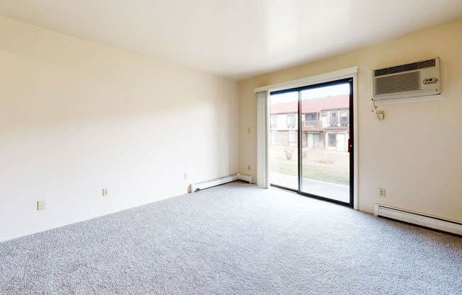 living room with a door to a patio