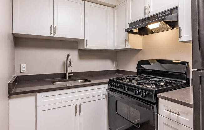 Renovated kitchen with gas stove