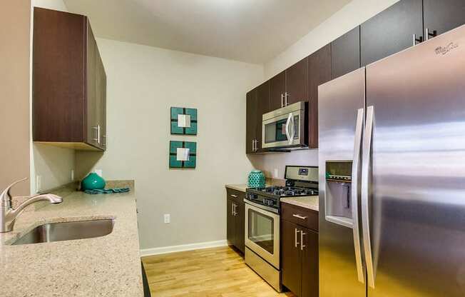 Modern Kitchen With Stainless Steel Appliances And Double Door Refrigerators at Water's Edge, Harrison, NJ, 07029