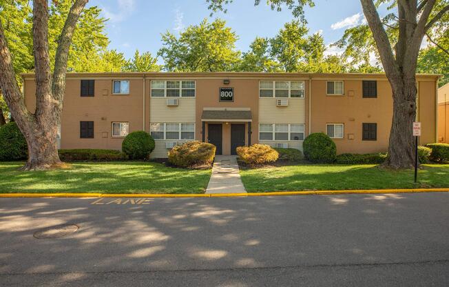 a small house in the middle of a road