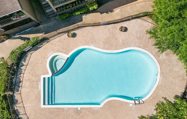 one of two sparkling blue pools and expansive sundeck at Kirkwood Landing Apartments