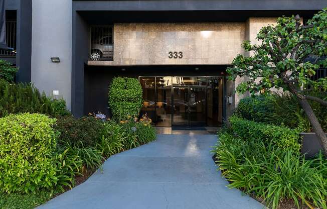 a view of the front of the building from the sidewalk