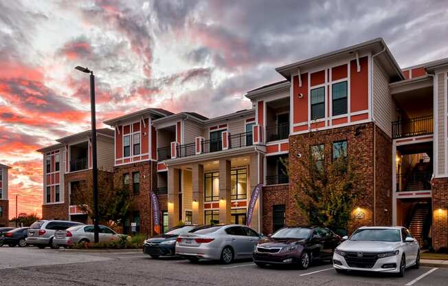 a row of cars parked in front of a building at Nexus at Sandhill, South Carolina, 29229