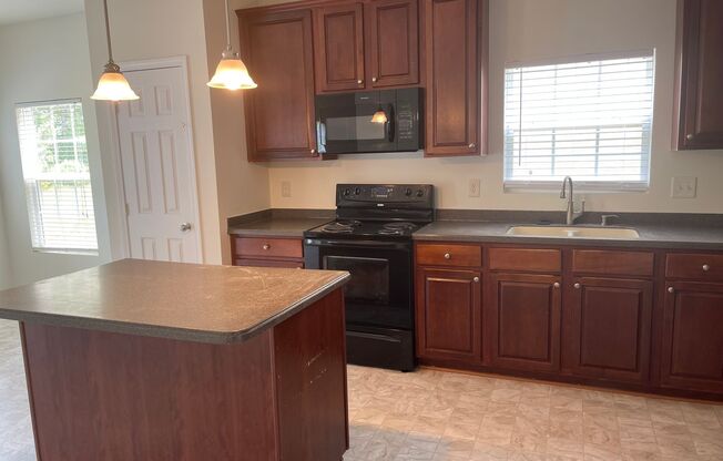 Spacious 4 Bedroom Home with Two-Car Garage in Swann's Mill Community